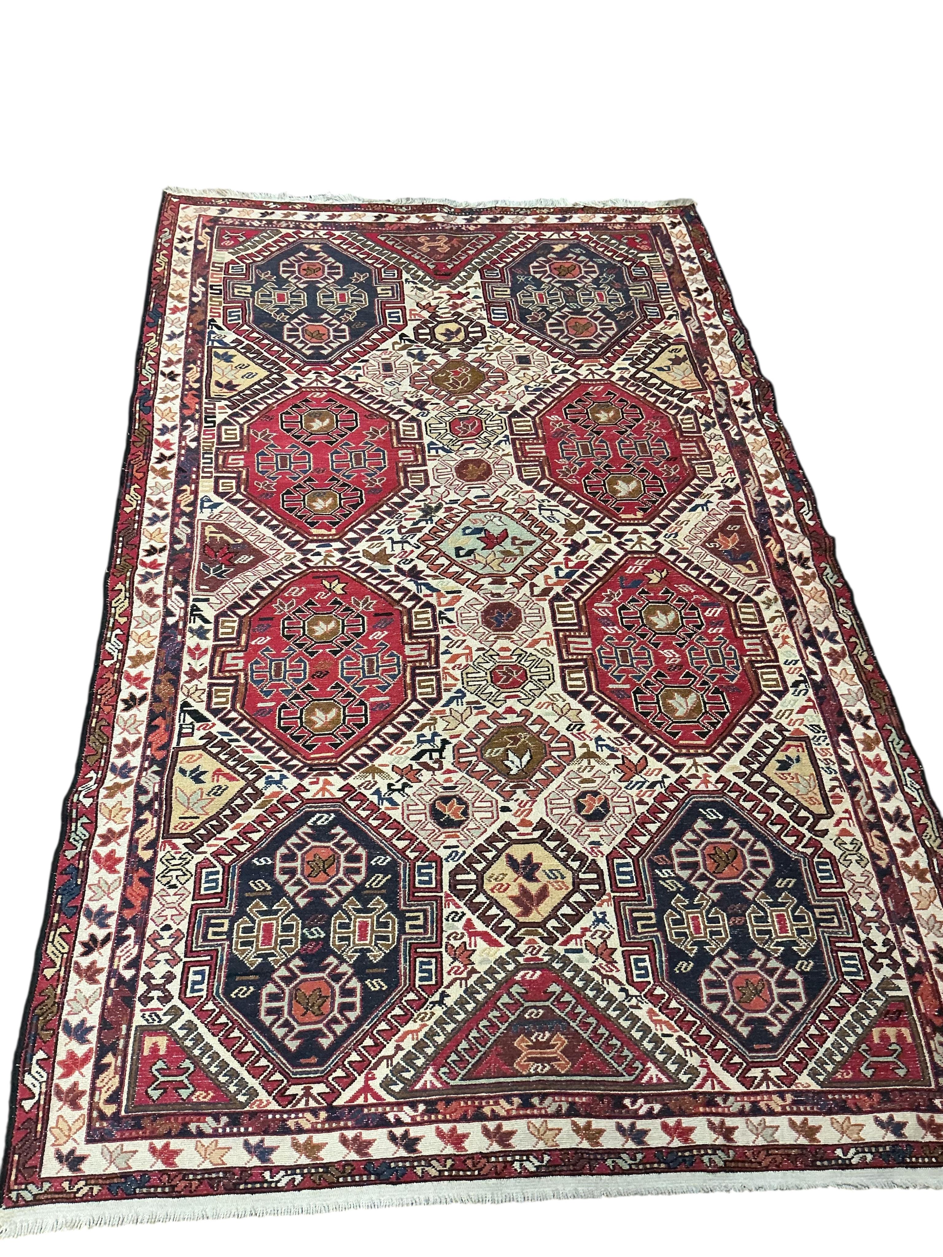 A Soumak blue ground rug, 200 x 120cm